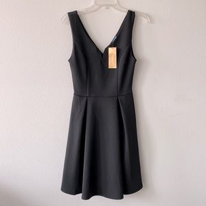 Francescas classic black cocktail dress- Small